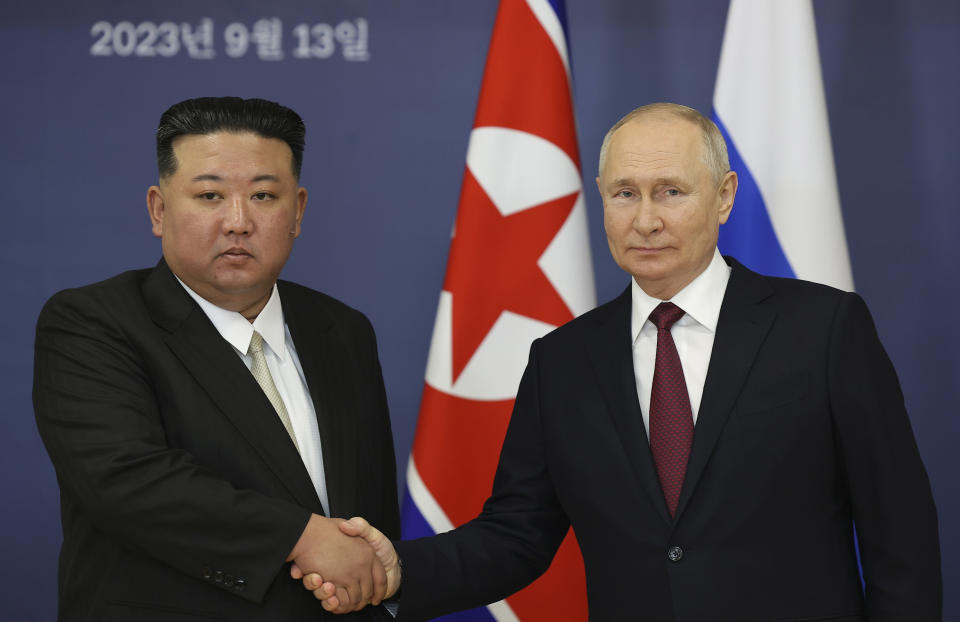 Russian President Vladimir Putin, right, and North Korea's leader Kim Jong Un shake hands during their meeting at the Vostochny cosmodrome outside the city of Tsiolkovsky, about 200 kilometers (125 miles) from the city of Blagoveshchensk in the far eastern Amur region, Russia, on Wednesday, Sept. 13, 2023. (Vladimir Smirnov, Sputnik, Kremlin Pool Photo via AP)