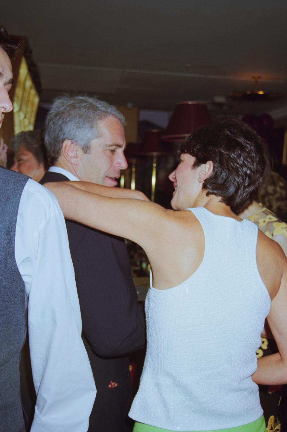 jeffrey epstein ghislaine maxwell back angle