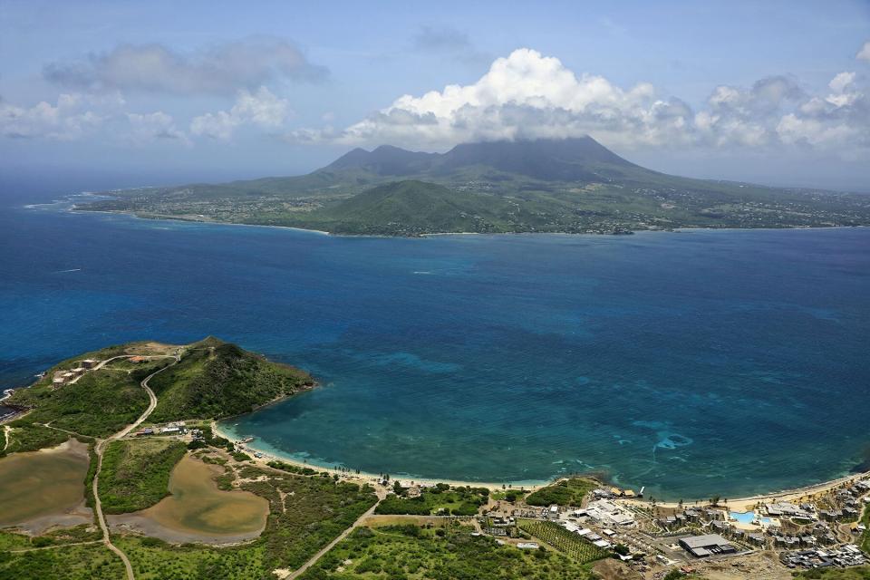 The Caribbean, St. Kitts and Nevis: aerial view of The Narrows ( 'The Straits') channel between the islands of Nevis (foreground) and St. Christopher