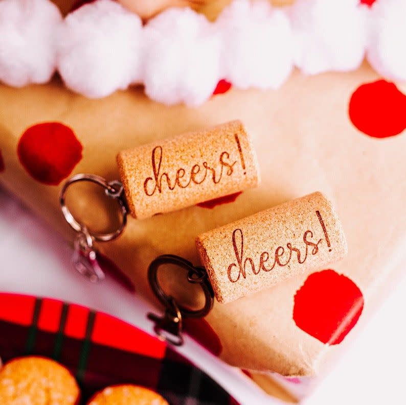 <p><strong>DesertCoastalStudios</strong></p><p>etsy.com</p><p><strong>$3.95</strong></p><p>Here's another keychain that doubles as the perfect stocking stuffer. Gift "cheer" cork keychains to the wine lovers in your life. They make sweet presents to welcome the holidays, New Year or joyful moment in someone's life. </p>