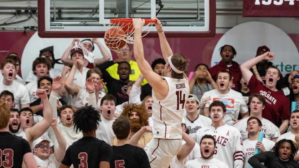 Colgate's Keegan Records dunks the ball in front of the student section inside Cotterell Court at Colgate University in Hamilton, NY on Wednesday, March 8, 2023. Colgate went on to defeat Lafayette 79-61 to win the Patriot League Championship.