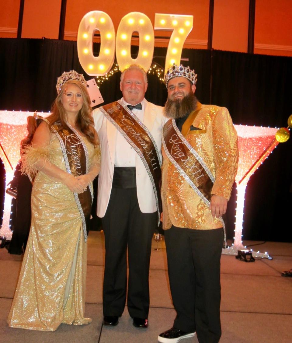 Krewe des Ambassadeurs XXII Queen Alicia Adams, Captain Tim Borst and King Thomas Adams at the Krewe's 2024 coronation event.