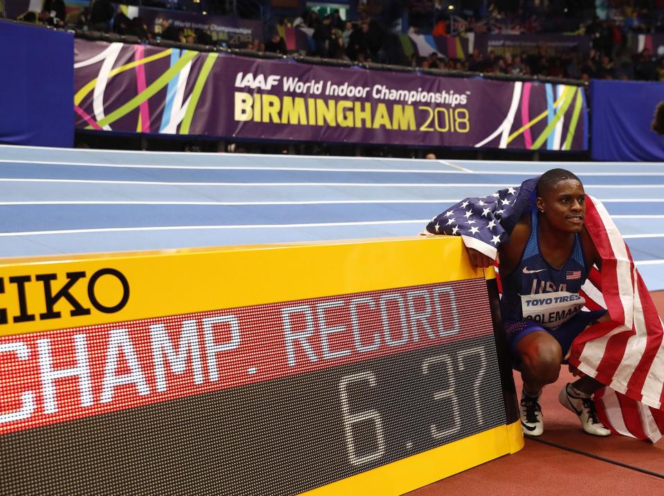 Christian Coleman poses with his winning 60m time: AFP/Getty Images