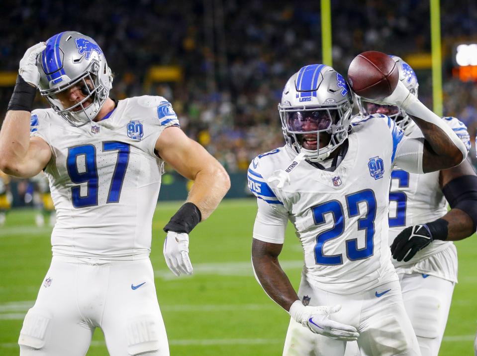 Detroit Lions cornerback <a class="link " href="https://sports.yahoo.com/nfl/players/33768" data-i13n="sec:content-canvas;subsec:anchor_text;elm:context_link" data-ylk="slk:Jerry Jacobs;sec:content-canvas;subsec:anchor_text;elm:context_link;itc:0">Jerry Jacobs</a> (23) celebrates with defensive end <a class="link " href="https://sports.yahoo.com/nfl/players/33957" data-i13n="sec:content-canvas;subsec:anchor_text;elm:context_link" data-ylk="slk:Aidan Hutchinson;sec:content-canvas;subsec:anchor_text;elm:context_link;itc:0">Aidan Hutchinson</a> (97) after intercepting a pass against the <a class="link " href="https://sports.yahoo.com/nfl/teams/green-bay/" data-i13n="sec:content-canvas;subsec:anchor_text;elm:context_link" data-ylk="slk:Green Bay Packers;sec:content-canvas;subsec:anchor_text;elm:context_link;itc:0">Green Bay Packers</a> during their football game on Thursday, September 28, 2023, at Lambeau Field in Green Bay, Wis. The Lions won the game, 34-20.<br>Tork Mason/USA TODAY NETWORK-Wisconsin