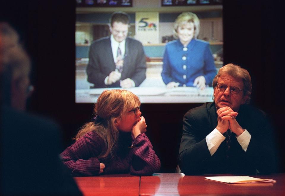 May 1997: Talk show host Jerry Springer, joined by daughter Katie, meet with media after Springer delivered his first commentary on WMAQ in Chicago. The two anchors sign off at the end of the program in the video background. Springer is in the center of controversy follwing his hiring to do commentary on the Chicago NBC station. The Enquirer/Michael E. Keating