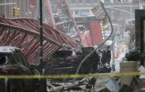 Emergency crews survey a massive construction crane collapse on a street in downtown Manhattan in New York, February 5, 2016. REUTERS/Brendan McDermid