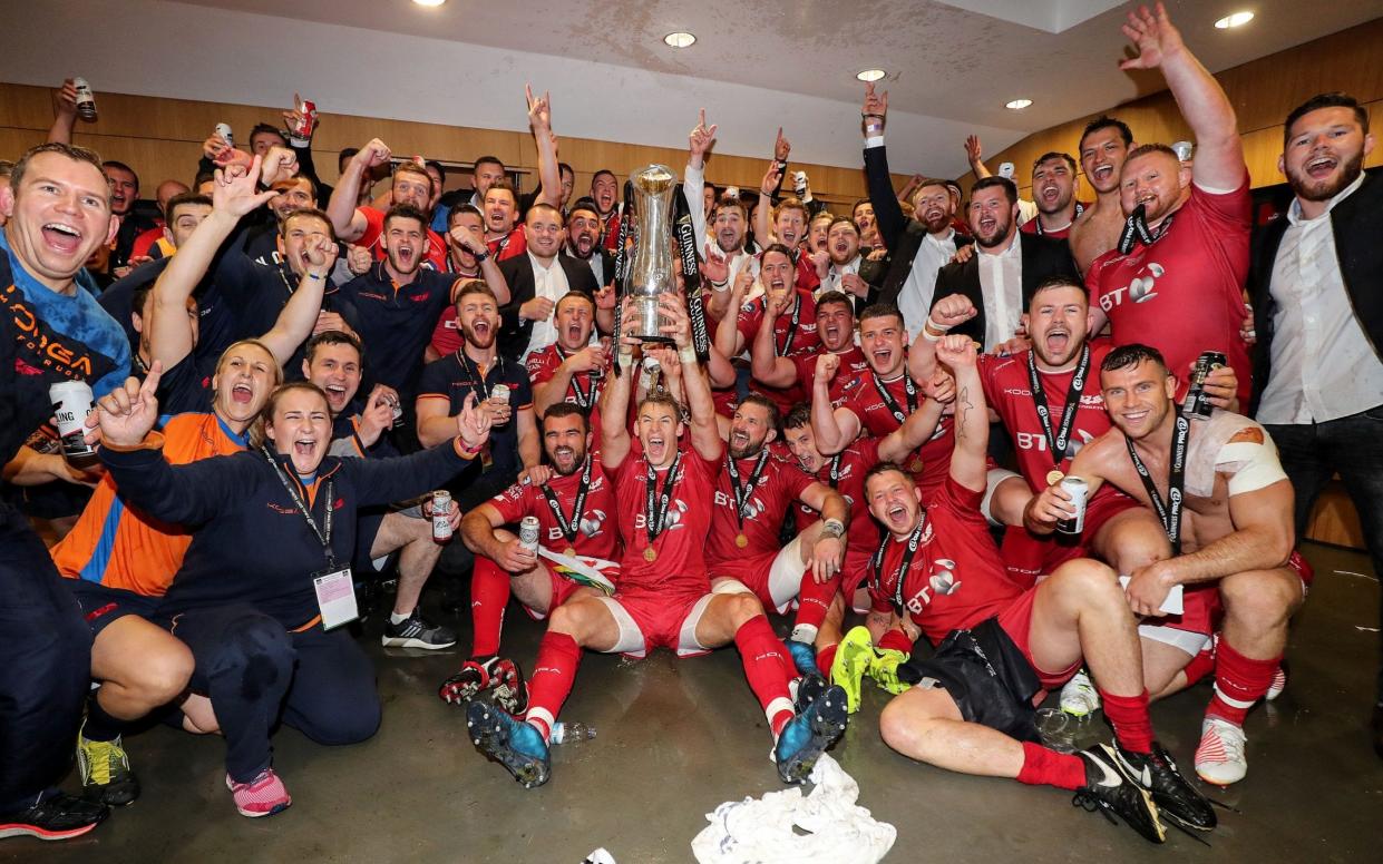 Scarlets celebrates in the changing room - Rex Features