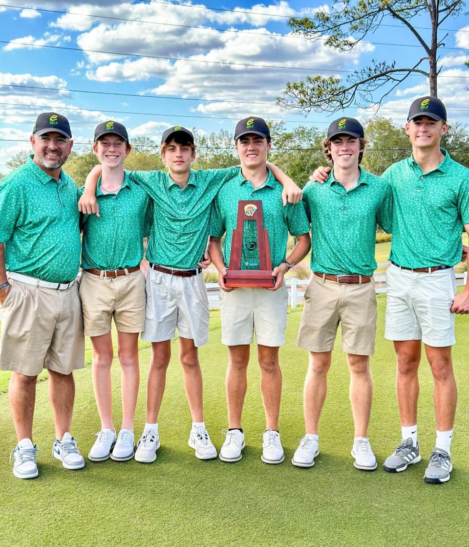 The Pensacola Catholic boys golf team celebrates after winning the District 1-1A title on Tuesday, Oct. 24, 2023 at Eagle Springs Golf Course in Defuniak Springs.
