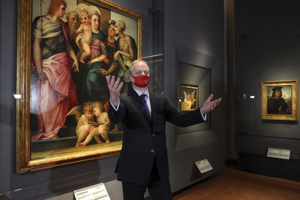 Uffizi director Eike Schmidt poses on the occasion of the Uffizi Gallery museum reopening to the public, in Florence, Italy, Tuesday, May 4, 2021. The Uffizi Gallery reopened to visitors after a shutdown following COVID-19 containment measures. (Giuseppe Cabras/LaPresse via AP)