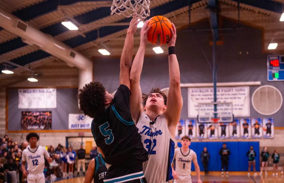 Rocklin Thunder center Mark Lavrenov (32) takes a shot as he’s defended by the Sheldon Huskies’ Jaden Spears (5) in the third quarter of a CIF Sac-Joaquin Section boys basketball Division I quarterfinal game on Friday, Feb. 16, 2024, in Rocklin.