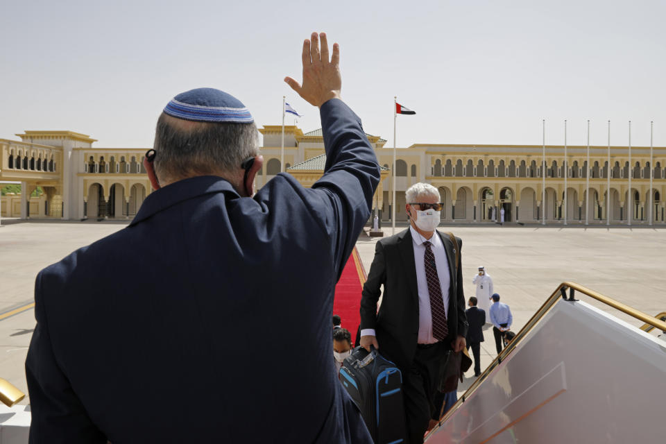 Israeli National Security Advisor Meir Ben-Shabbat waves as he boards a plane leaving Abu Dhabi, United Arab Emirates, Tuesday, Sept. 1, 2020. (Nir Elias/Pool via AP)