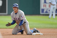 DETROIT, MI - OCTOBER 13: Ian Kinsler #5 of the Texas Rangers celebrates at second base after hitting a double off Justin Verlander #35 of the Detroit Tigers in the first inning of Game Five of the American League Championship Series at Comerica Park on October 13, 2011 in Detroit, Michigan. (Photo by Harry How/Getty Images)