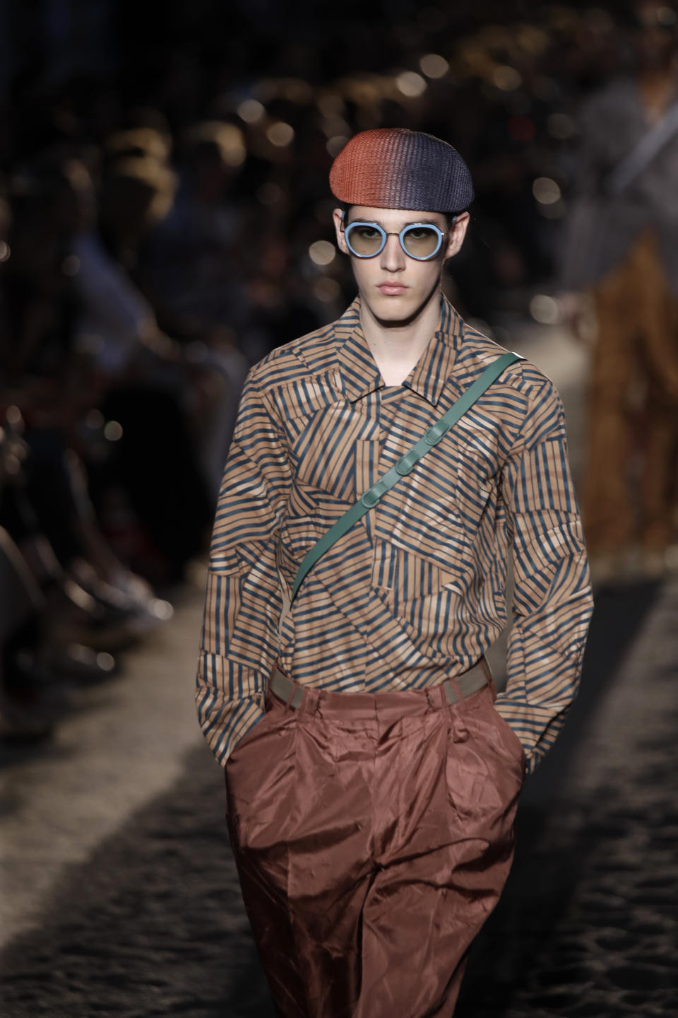 A model wears a creation as part of the Ermenegildo Zegna men's Spring-Summer 2020 collection, unveiled during the fashion week, in Milan, Italy, Friday, June 14, 2019. (AP Photo/Luca Bruno)