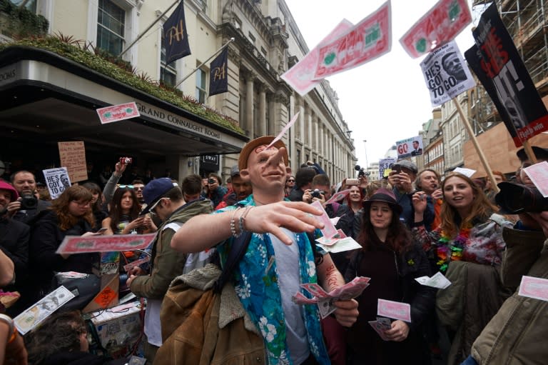 Protesters demonstrate against British Prime Minister David Cameron in London following revelations in the Panama papers in April 2016