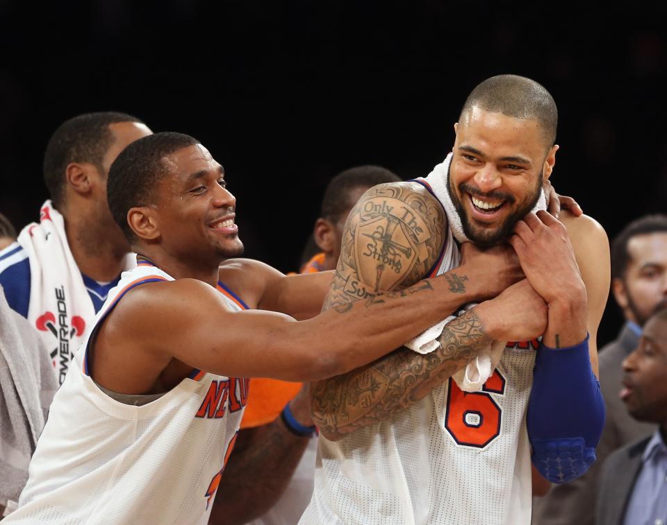 NEW YORK, NY - JANUARY 03: James White #4 grabs Tyson Chandler #6 of the New York Knicks following the Knicks 100-83 victory over the San Antonio Spurs at Madison Square Garden on January 3, 2013 in New York City. NOTE TO USER: User expressly acknowledges and agrees that, by downloading and/or using this photograph, user is consenting to the terms and conditions of the Getty Images License Agreement. (Photo by Bruce Bennett/Getty Images)