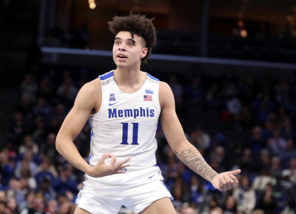 Memphis guard Lester Quinones celebrates after a basket in the second half of an NCAA college basketball game against Tulane, Monday, Dec. 30, 2019, in Memphis, Tenn. (AP Photo/Karen Pulfer Focht)