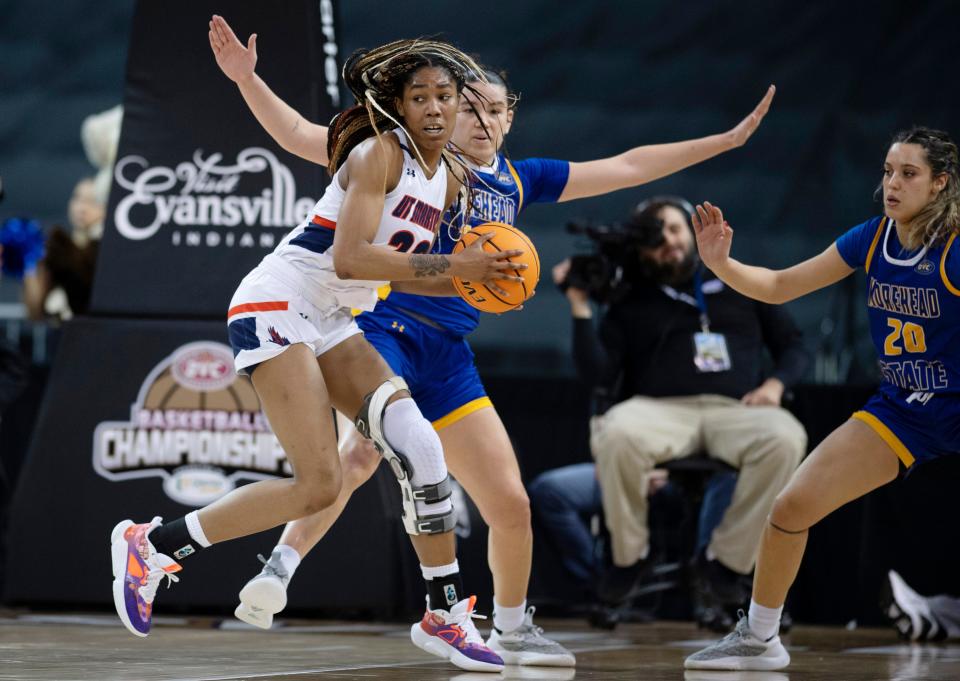 Tennessee Martin's Sharnecce Currie-Jelks (23) is guarded by Morehead State's Sophie Benharouga (14) during their first round game of the Ohio Valley Conference Women's Basketball Championship at Ford Center in Evansville, Ind., Wednesday afternoon, March 1, 2023.
(Photo: DENNY SIMMONS / COURIER & PRESS)