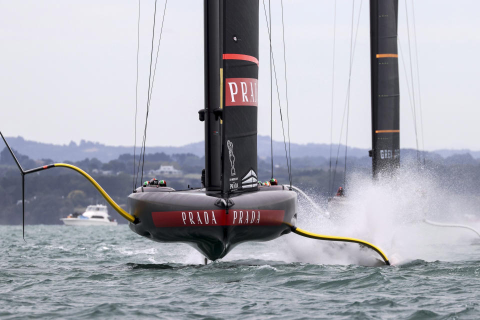 Italy's Luna Rossa leads Britain's INEOS Team UK to win race three of the Prada Cup on Auckland's Waitemata Harbour, New Zealand, Sunday, Feb.14, 2021. (Brett Phibbs/NZ Herald via AP)