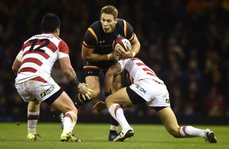 Britain Rugby Union - Wales v Japan - Principality Stadium, Cardiff, Wales - 19/11/16 Wales' Liam Williams is tackled by Japan's Timothy Lafaele Reuters / Rebecca Naden Livepic