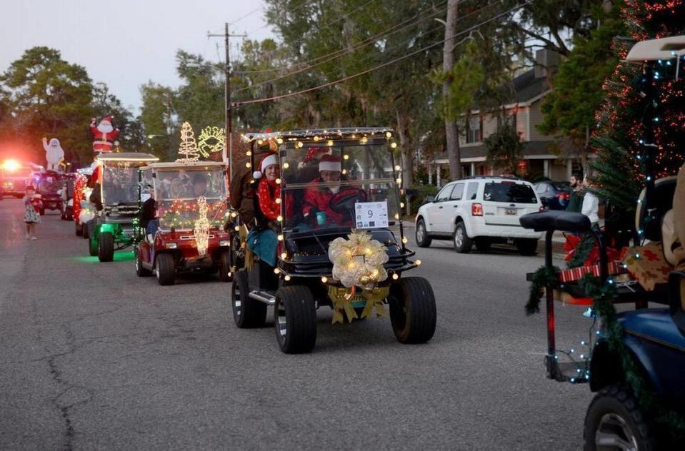 Photographs taken during the 7th Annual Port Royal Christmas Golf Cart Parade on Saturday, Dec. 10, 2016, in Port Royal. The Port Royal Veterinary Hospital won first place overall for their golf cart decorations.