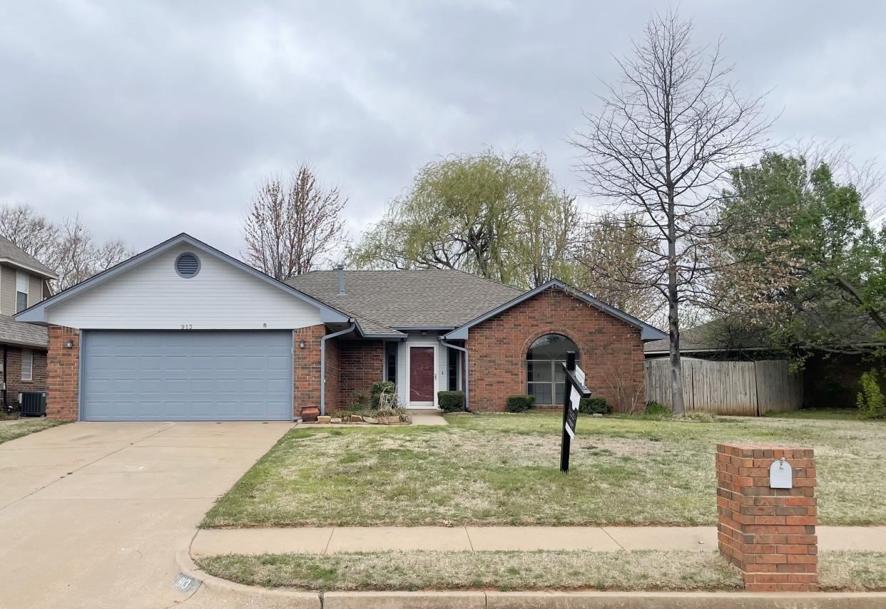 This three-bedroom, two-bath home, with 1,689 square feet of space, at 913 Blue Ridge Drive in Edmond, is listed for $249,990 with RE/Max at Home.