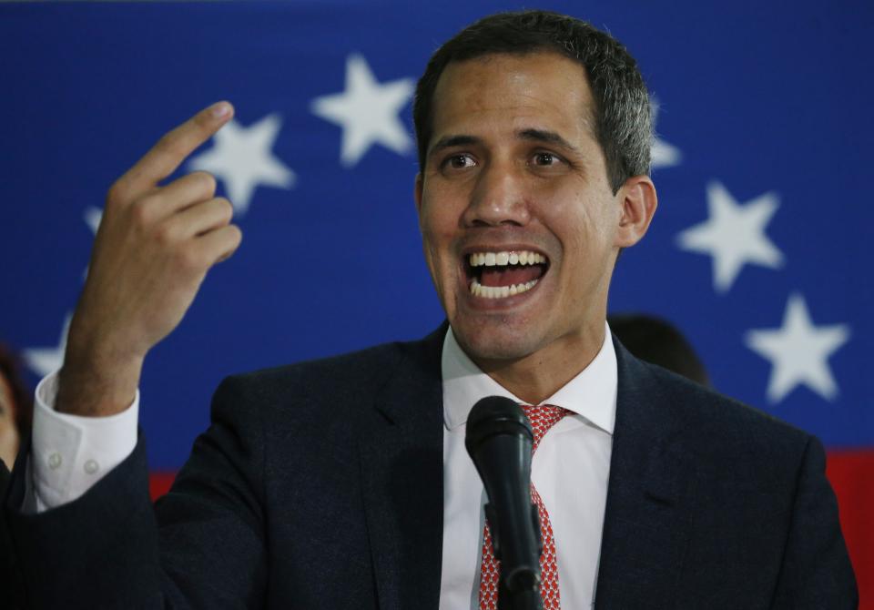 Venezuela's opposition leader and self-proclaimed interim President Juan Guaido speaks to journalists during a press conference in Caracas, Venezuela, Monday, June 17, 2019. (AP Photo/Ariana Cubillos)