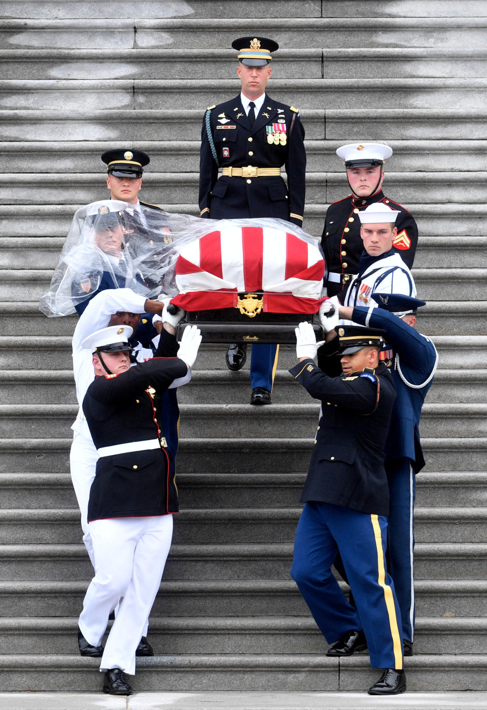 <p>The casket of Senator John McCain, R-Ariz., is carried down the steps of the U.S. Capitol in Washington D.C. on Saturday, Sept. 01, 2018, in Washington, D.C. (Photo: Marvin Joseph/Pool Via Reuters) </p>