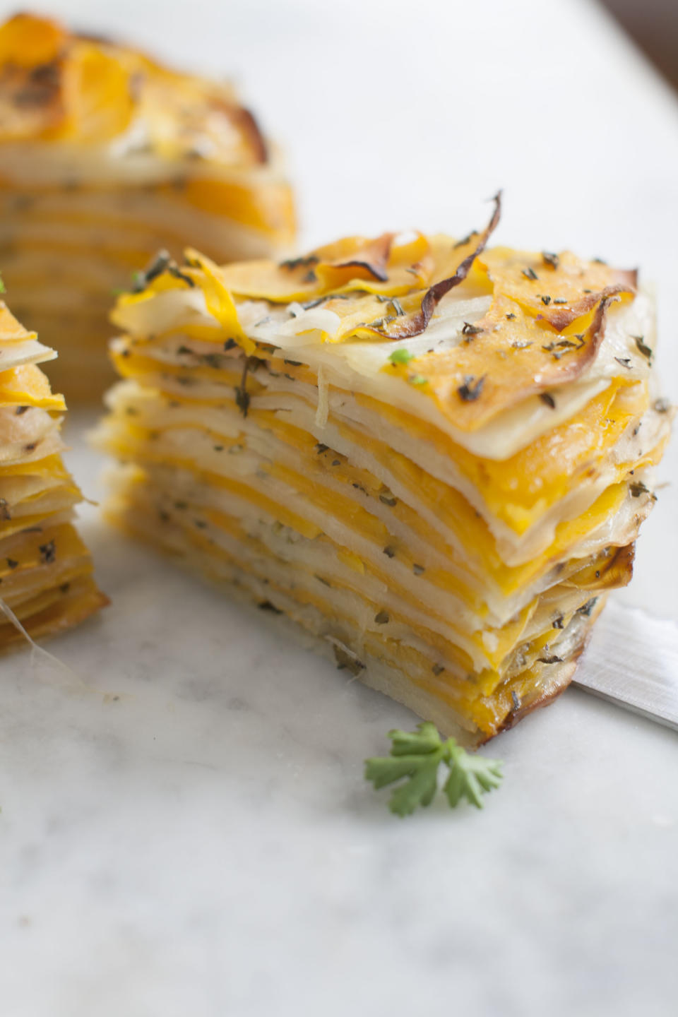 This March 31, 2014 photo shows roasted butternut and herb tart in Concord, N.H. (AP Photo/Matthew Mead)