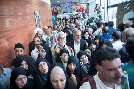 Iranian pilgrims wait at the Imam Khomeini Airport as they depart for the annual haj pilgrimage to the holy city of Mecca, in Tehran, Iran July 31, 2017. Nazanin Tabatabaee Yazdi /TIMA via REUTERS.