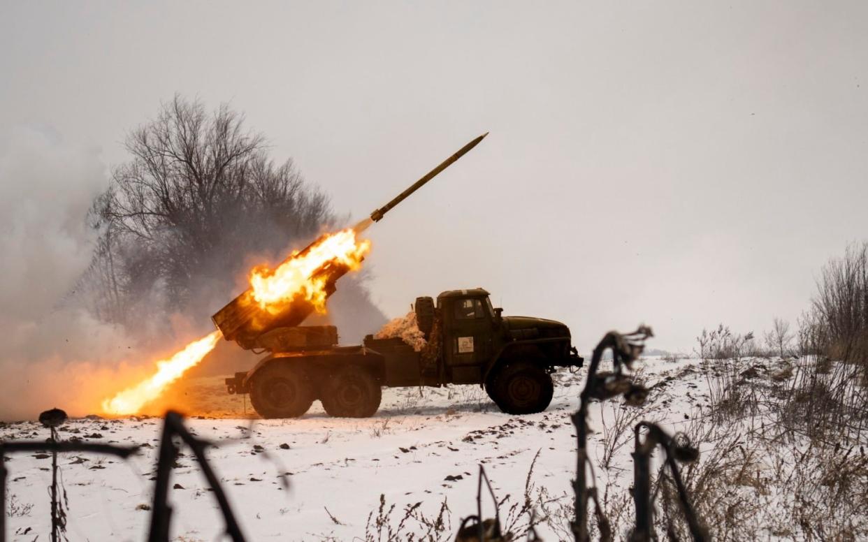 FILE - Ukrainian servicemen of the Prince Roman the Great 14th Separate Mechanized Brigade fire a Soviet era Grad multiple rocket launcher at Russian positions in the Kharkiv area, Ukraine, Saturday, Feb. 25, 2023. Europeâ€™s biggest armed conflict since World War II is poised to enter a key new phase in the coming weeks. With no suggestion of a negotiated end to the 13 months of fighting between Russia and Ukraine, a counteroffensive by Kyivâ€™s troops is in the cards. (AP Photo/Vadim Ghirda, File) - AP Photo/Vadim Ghirda, File