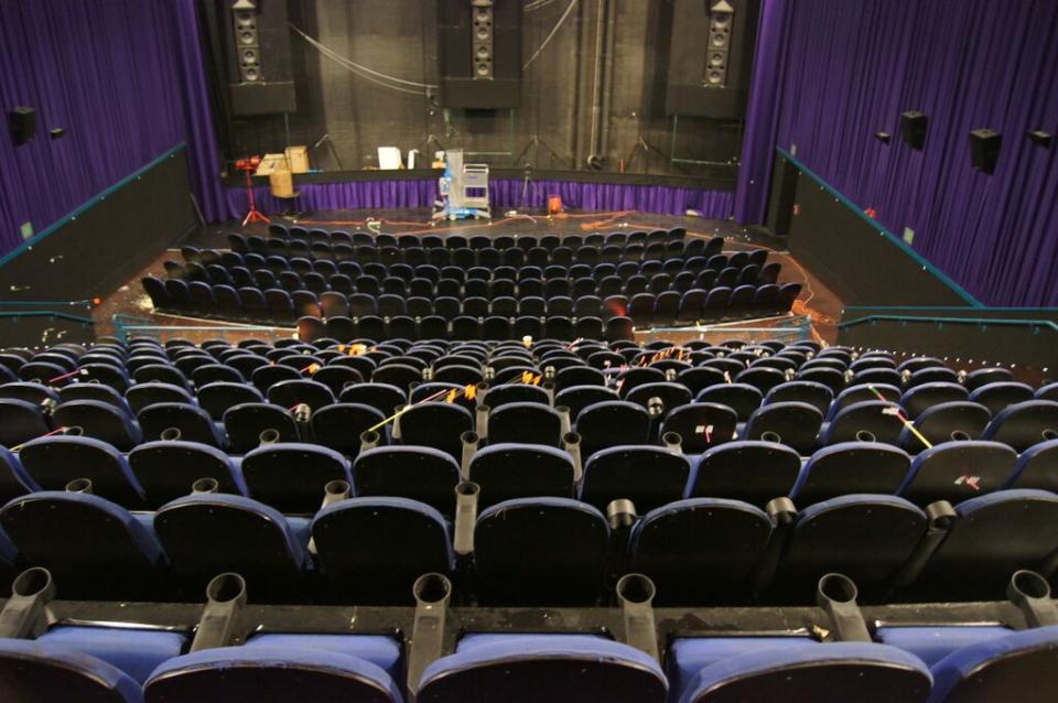 This July 2012 evidence photo shows the marking of bullet holes inside the movie theater. (Arapahoe County District Attorney's Office via AP)