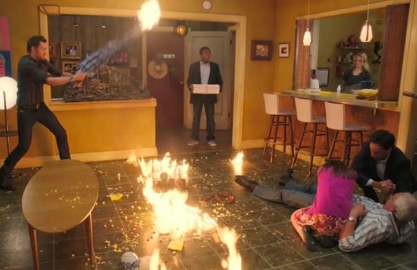 Troy walks into his apartment with pizza to find fire and chaos 