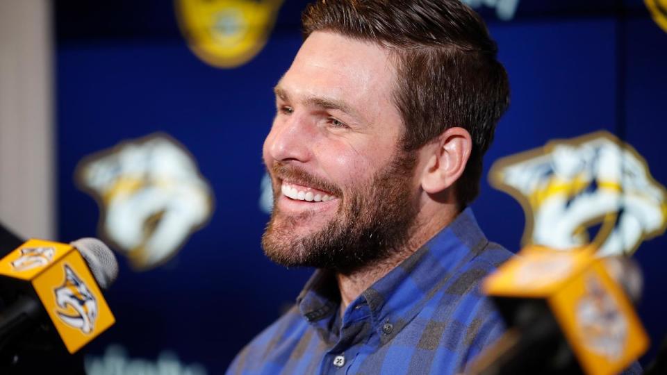 What are those chants you hear wafting through Music City? Oh, just the sound of ecstatic fans welcoming Mike Fisher back to the Nashville Predators.