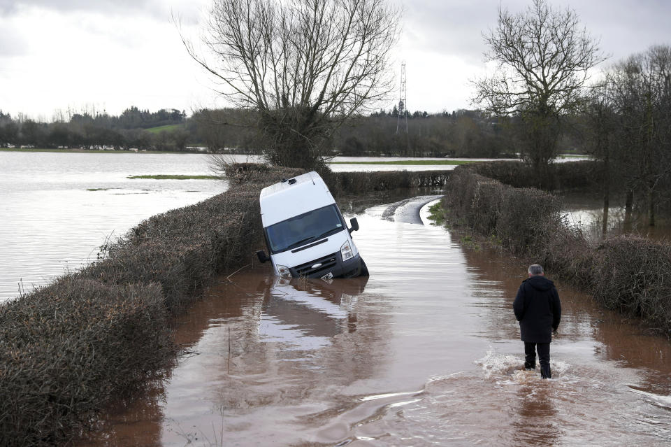 A van sits in floodwater near the village of Hampton Bishop near Hereford, after the River Lugg burst its banks in the aftermath of Storm Dennis.