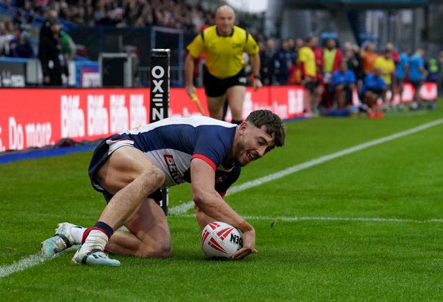 Matty Ashton scored two tries as England took an unassailable 2-0 lead in the three-match series against Tonga