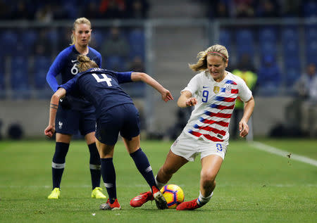 Soccer Football - Women's International Friendly - France v United States - Stade Oceane, Le Havre, France - January 19, 2019 Lindsey Horan of U.S. in action with France's Marion Torrent REUTERS/Pascal Rossignol