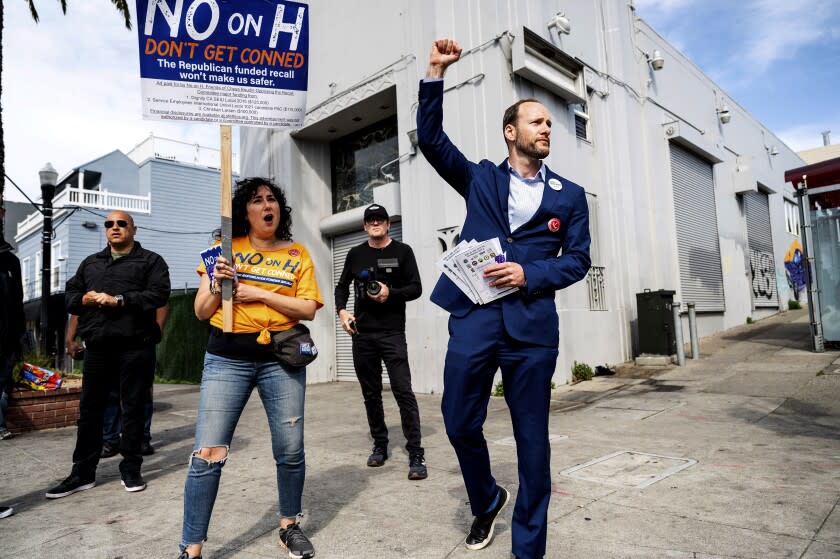 San Francisco District Attorney Chesa Boudin, who is fighting a recall effort on Tuesday's ballot, campaigns on Tuesday, June 7, 2022, in San Francisco. Recall proponents say Boudin's policies have made San Francisco less safe. (AP Photo/Noah Berger)