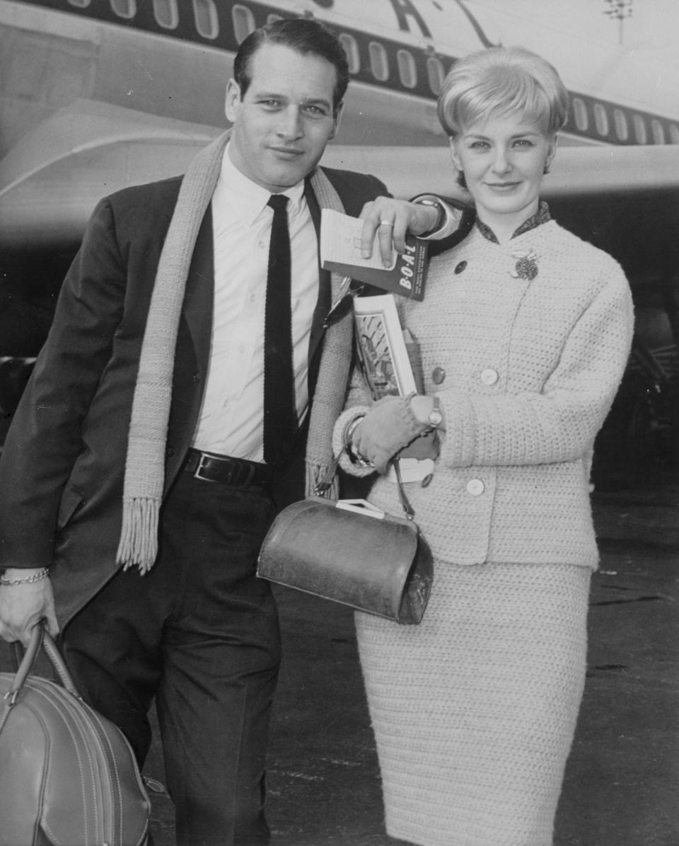 Actor Paul Newman and wife, actress Joanne Woodward leave New York's Idlewild Airport via Boac Plane for Kingston, Jamaica, to begin a 10-day vacation, February 13, 1961.