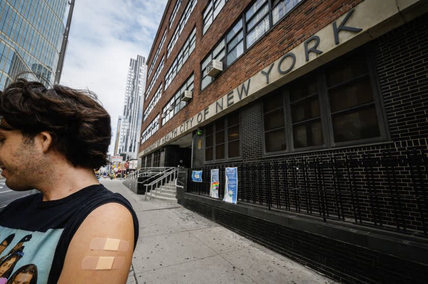 A man, who wished to remain annonymous, displays his arm where he recieved a polio vaccination, outside a health clinic in Brooklyn, New York on August 17, 2022. - In July, a polio case was reported in Rockland County, about 30 miles (50 kilometers) northwest of Manhattan -- the first one in the United States in nearly a decade. (Photo by Ed JONES / AFP) (Photo by ED JONES/AFP via Getty Images)