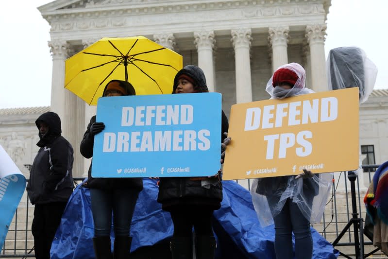 People gather outside the U.S. Supreme Court during oral arguments in Trump administration’s bid to end the DACA program in Washington