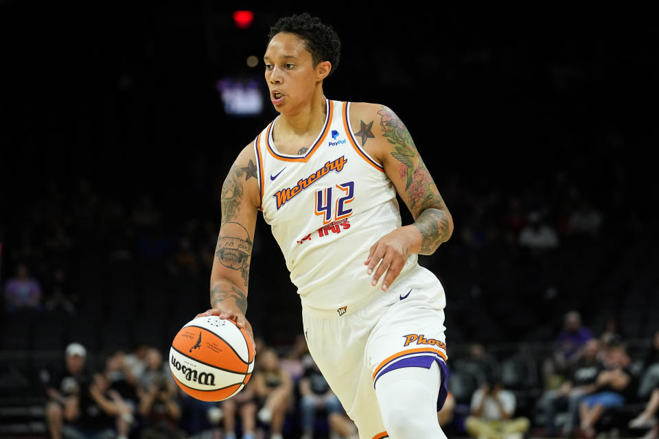 Phoenix Mercury center Brittney Griner drives against the Los Angeles Sparks during the first half of a WNBA preseason basketball game, Friday, May 12, 2023, in Phoenix. (AP Photo/Matt York)