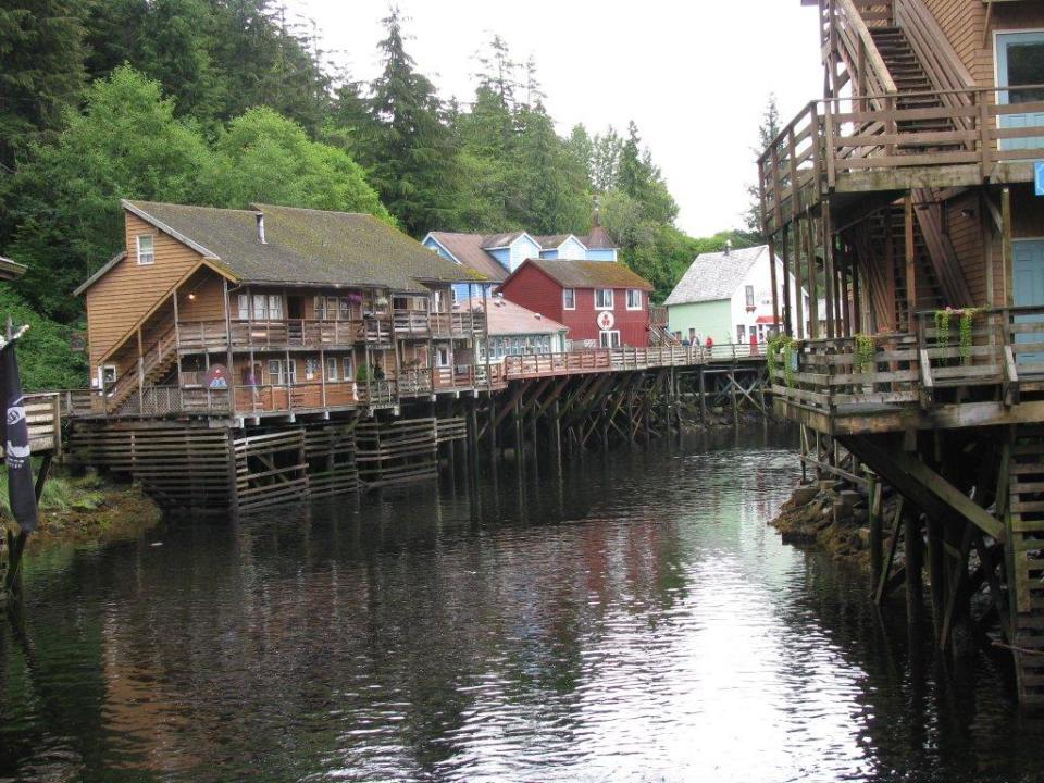 This August 2010 file photo shows a glimpse of Creek Street, a destination dotted with shops, galleries and restaurants, in Ketchikan, Alaska. This southeast Alaska town is now known more for tourism than its once-thriving timber industry. (AP Photo/Becky Bohrer)