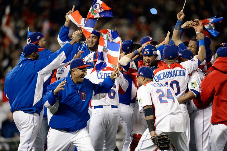 SAN FRANCISCO, CA - MARCH 19: The Dominican Republic celerbates after defeating Puerto Rico to win the Championship Round of the 2013 World Baseball Classic by a score of 3-0 at AT&T Park on March 19, 2013 in San Francisco, California. (Photo by Thearon W. Henderson/Getty Images)