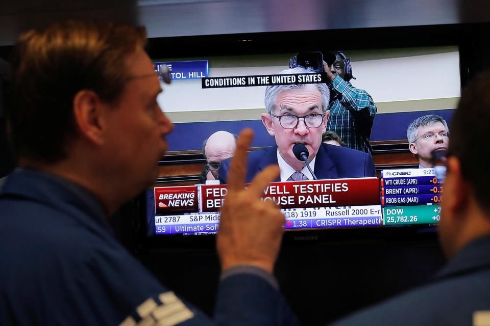 Federal Reserve Chairman Jerome Powell speaks on a television as traders work on the floor of the New York Stock Exchange in New York, U.S., February 27, 2018.  REUTERS/Lucas Jackson