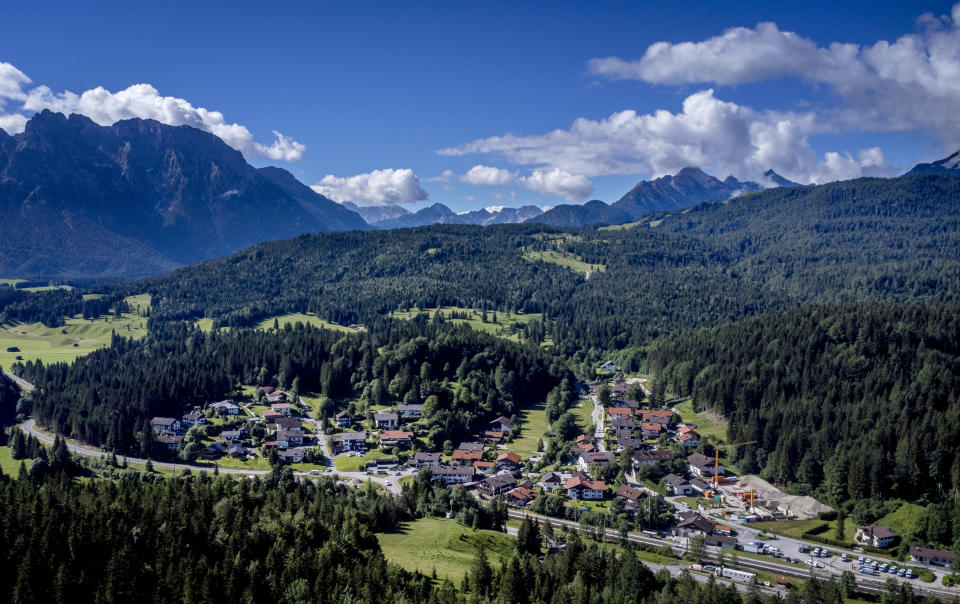 The village of Klais, Germany from where the road goes up to Elmau Castle is pictured Saturday, June 25, 2022. The G7 summit will start on Sunday. (AP Photo/Michael Probst)