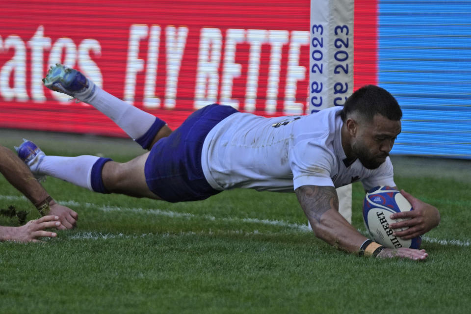 Samoa's Duncan Paia'aua scores a try during the Rugby World Cup Pool D match between Samoa and Chile at the Stade de Bordeaux in Bordeaux, France, Saturday, Sept. 16, 2023. (AP Photo/Themba Hadebe)