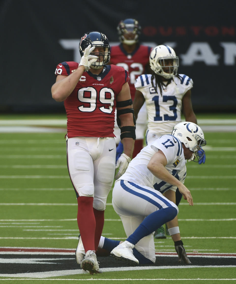 Houston Texans defensive end J.J. Watt (99) celebrates after he sacked Indianapolis Colts quarterback Philip Rivers (17) during the second half of an NFL football game Sunday, Dec. 6, 2020, in Houston. (AP Photo/Eric Christian Smith)