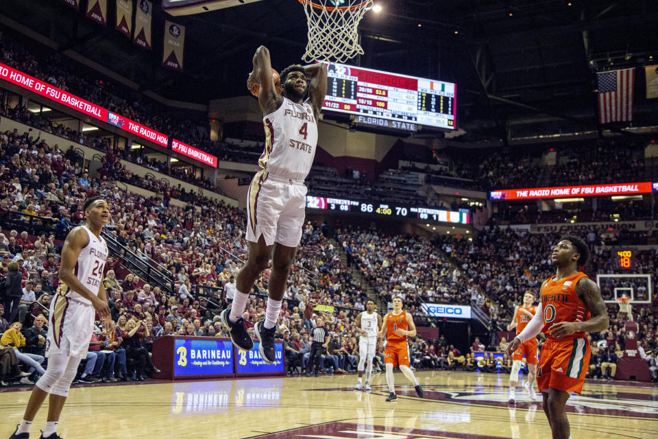 Florida State forward Patrick Williams (4) dunks against Miami in the second half of an NCAA college basketball game in Tallahassee, Fla., Saturday, Feb. 8, 2020. Florida State won 99-81. (AP Photo/Mark Wallheiser)