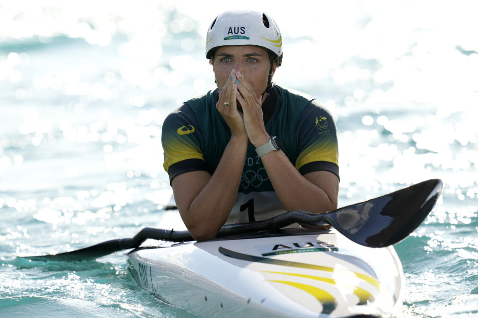 Jessica Fox of Australia reacts after crossing the finish line to win bronze in the Women's K1 of the Canoe Slalom at the 2020 Summer Olympics, Tuesday, July 27, 2021, in Tokyo, Japan. (AP Photo/Kirsty Wigglesworth)