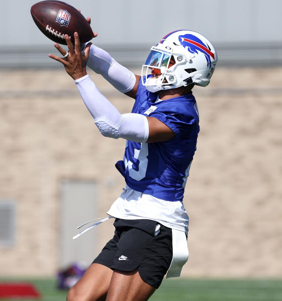 Bills safety Micah Hyde goes up for the ball during practice.